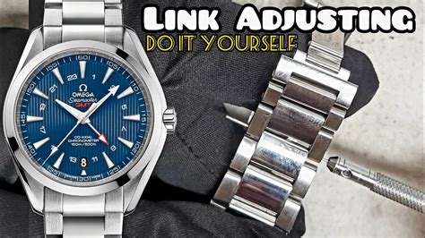 omega watch band adjustment